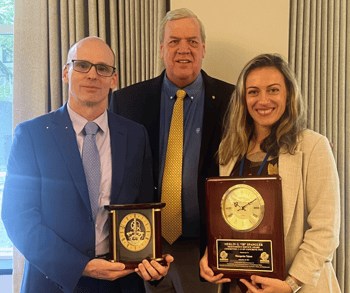 Josh Beakley and Margarita Takou hold their awards alongside ACPA President, Steven Hawkins